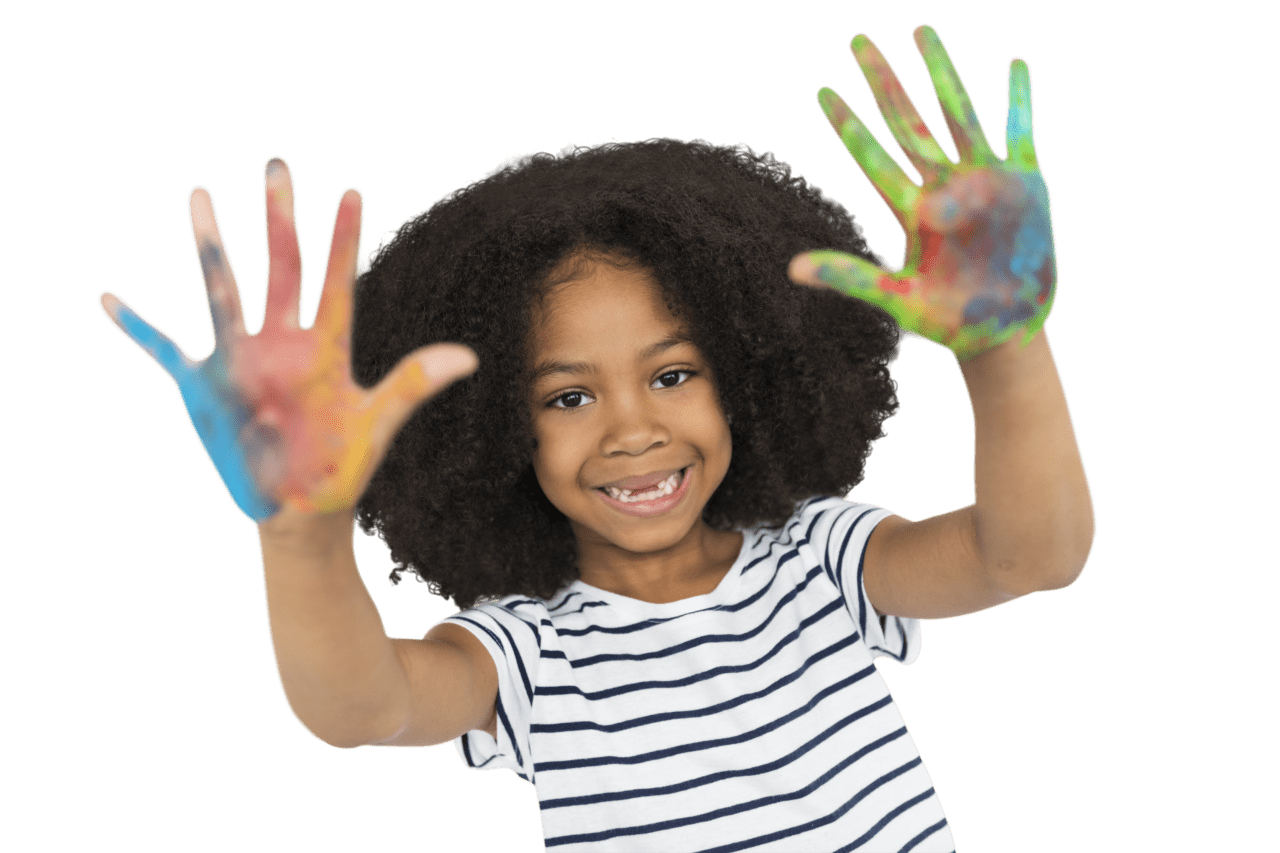 School age child with painted hands smiling