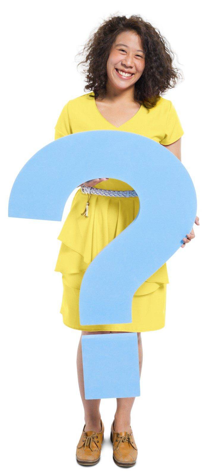 Norwell Pediatrics - FAQ Woman in Yellow Holding Blue Question mark