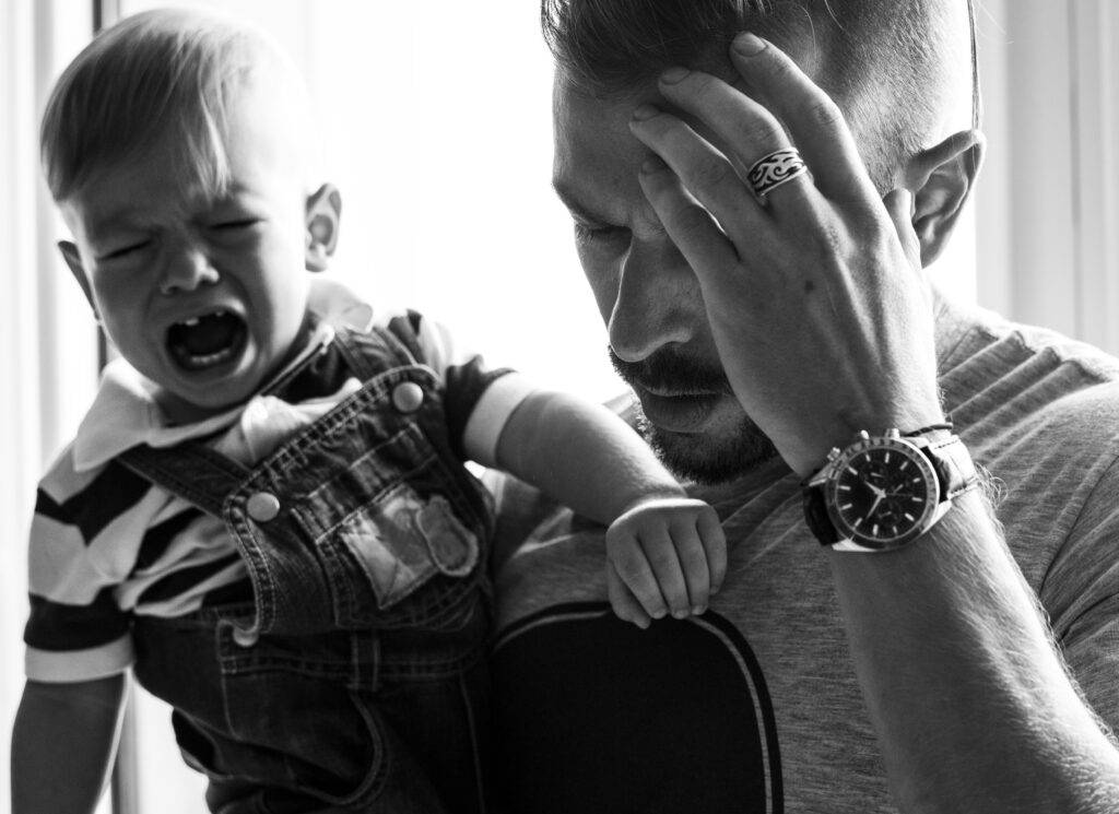 Dad stressed with toddler